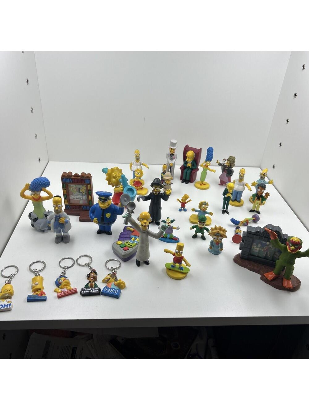 Assorted Simpson Figurines Lot  W/ 5 Keychains